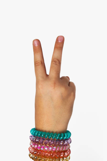 istock The hand of a child shows 2 937738660