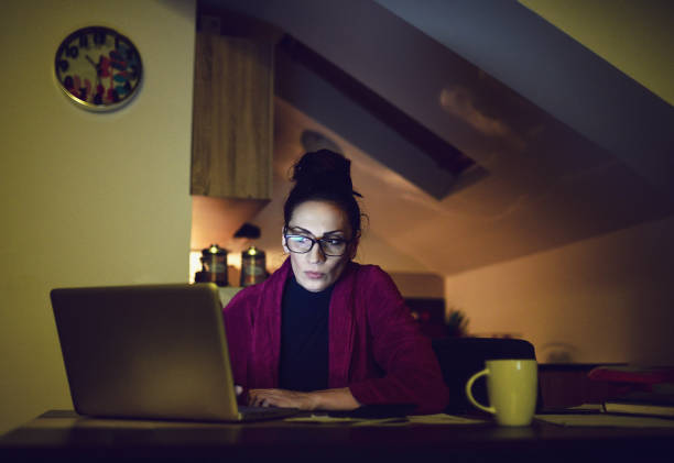 istock Young single mum working overtime because of financial problems 937743632