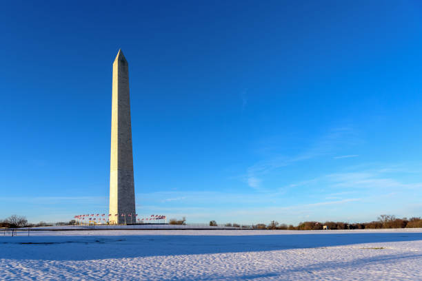 istock Washington Monument in snow, Washington DC 937746214