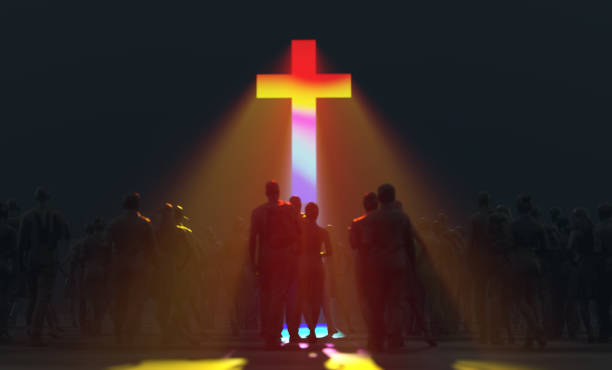 istock people near the shining cross 937749712