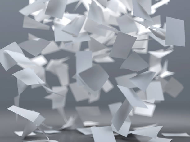 istock flying sheets of white paper 937749760