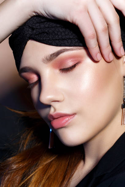 istock beautiful blond girl with dark makeup 937760248