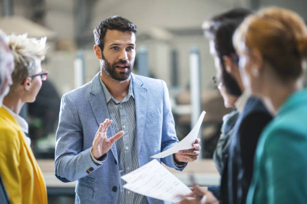 factory staff meeting. - leadership imagens e fotografias de stock