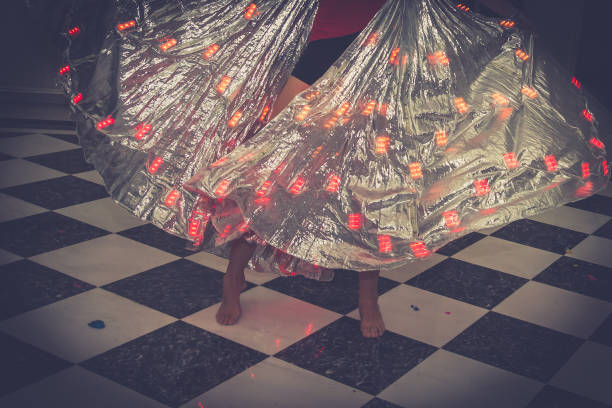istock Modern performance. Girl's feet dancing on the stage. 937788238
