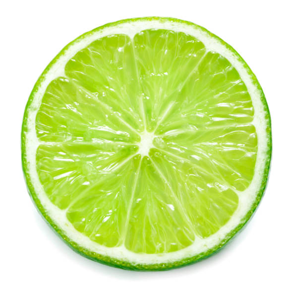 single slice of lime isolated on white background single slice of lime isolated on white background lime stock pictures, royalty-free photos & images