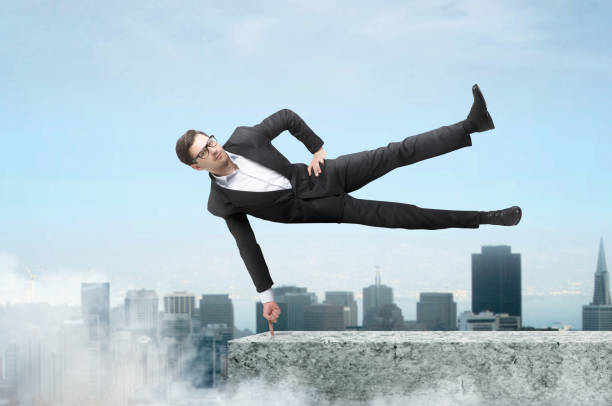 istock Businessman easily hangs on one finger 937791178