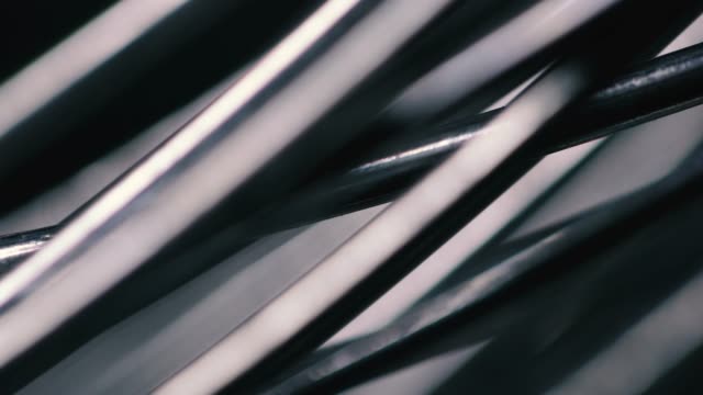 Metallic wire tangled on black background
