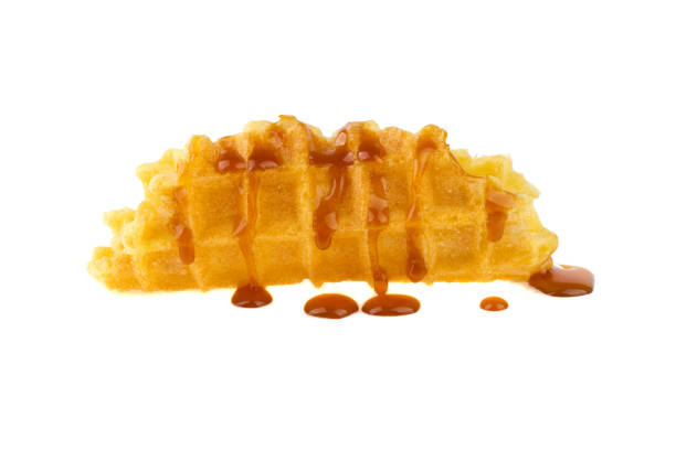 istock baking waffles and caramel isolated on white background 937797332