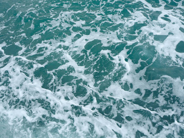 istock Sea waves caused by speeding boat. 937813522