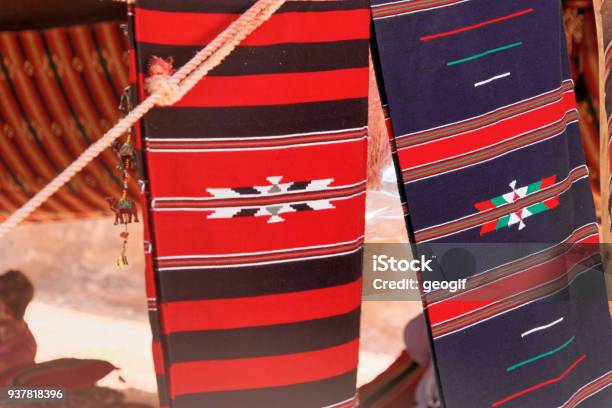 Red Blue And Coloured Bedouin Cloths On A Tent In The Desert Of The Wadi Rum Nature Reserve Jordan Stock Photo - Download Image Now