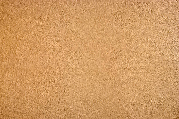 istock The plastered wall. The plaster is embossed. Good to use as a background. 937822136