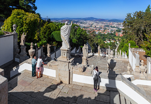 Braga, Portugal - August 21, 2016: The city of Braga seen from the top of the staircase of the Bom Jesus do Monte Sanctuary. One of the famous Portuguese sanctuaries. Baroque architecture.