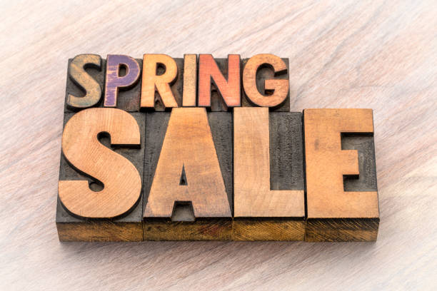 istock spring sale word abstract in wood type 937833230