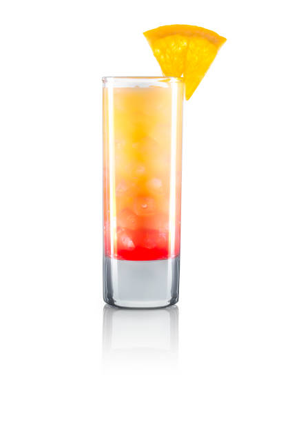 Yellow cocktail with lime isolated on white