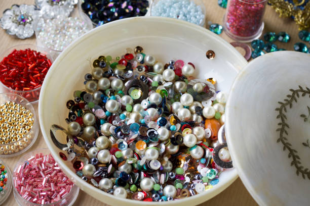 istock multicolored vintage pearls and beads in small boxes 937836178