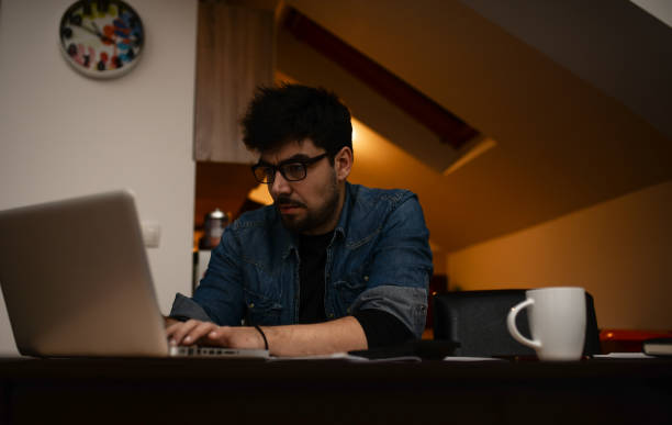 istock Young single dad working overtime because of financial problems 937836290