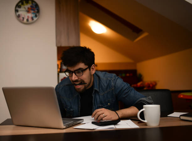 istock Young single dad working overtime because of financial problems 937836450