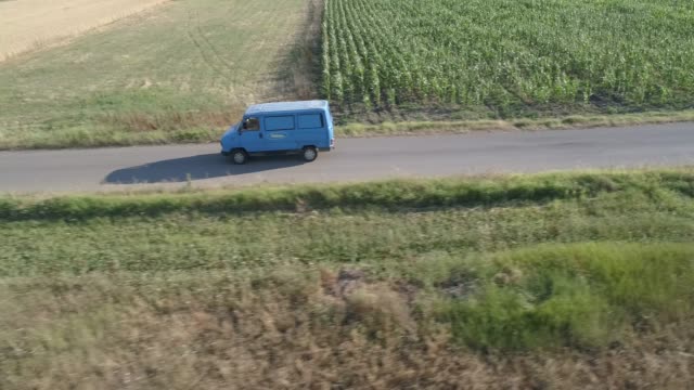 Truck on the country road in the summer