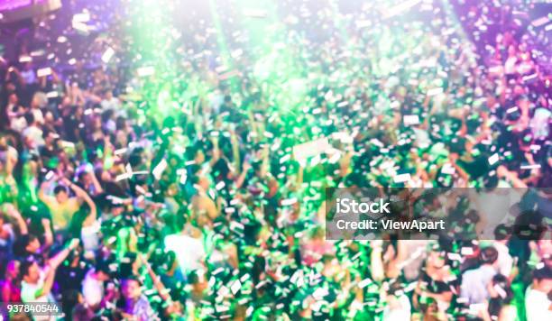 Blurred Defocused Background Of Concert Festival Event With Dj Playing After Party Music Entertainment And Nightlife Concept With Young People Dancing At Nightclub Friends Having Fun At Afterparty Stock Photo - Download Image Now