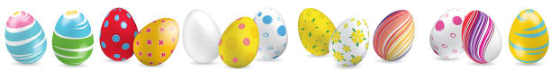 istock White, yellow, red, striped colorful Easter eggs on the white background. Set of bright Easter eggs 937846190