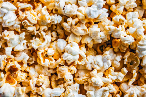 istock Lots of fresh popcorn closeup. Macro shot. 937846778