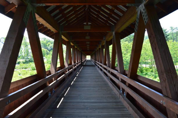 Covered foot bridge over the Ammonoosuc. stock photo