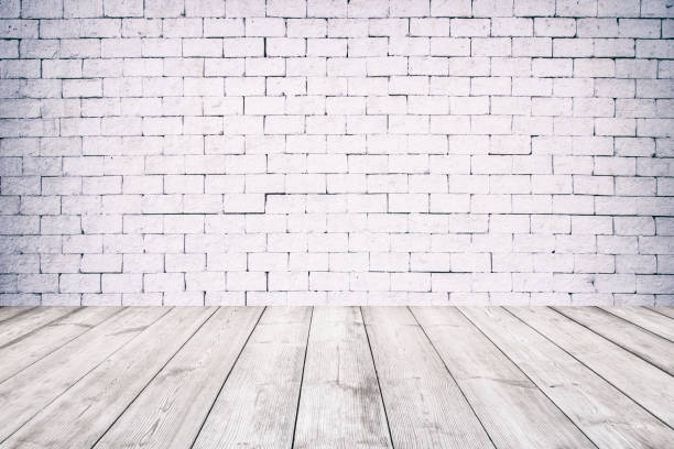 istock Room interior with white brick wall and wooden floor 937852004