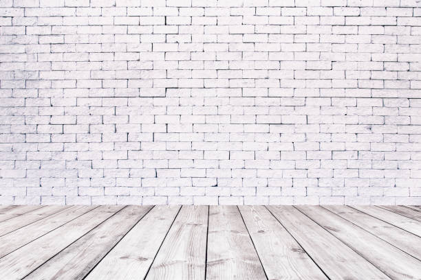 istock Room interior with white brick wall and wooden floor 937852192