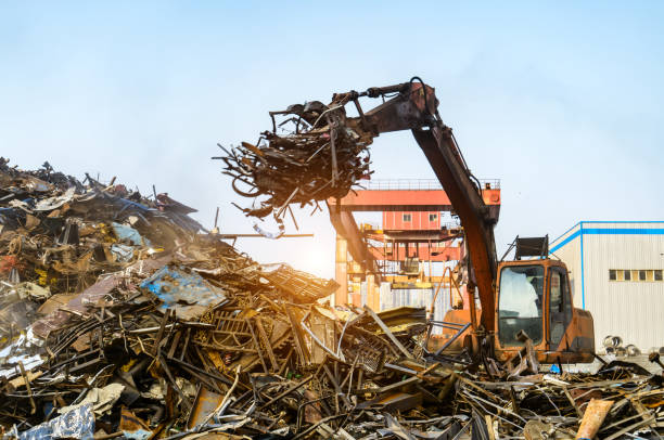 istock Grab crane works in waste recycling station 937862296