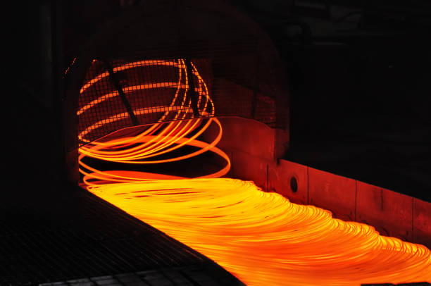 wire rolling mill coil forming laying head wire rolling mill coil forming laying head at steel plant rebar production stock pictures, royalty-free photos & images