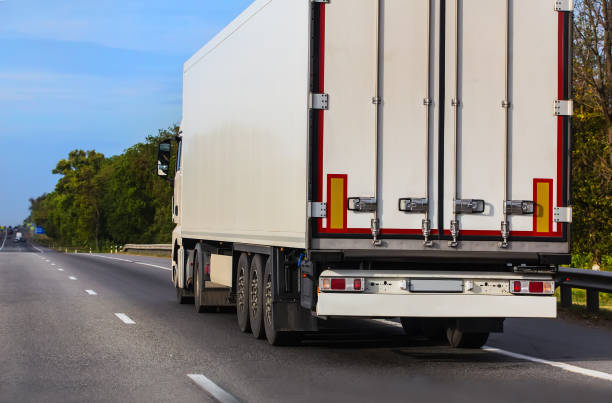 istock truck goes on the highway 937868024