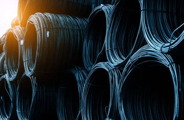 Photo of A pile of rolled steel cables in the wharf warehouse