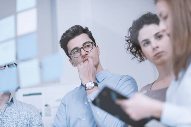 istock Young business people working together 937874096