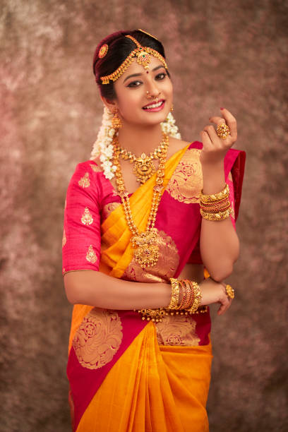 istock Beautiful smiling Indian bride with jewelry 937881766