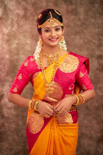istock Beautiful smiling Indian bride with jewelry 937881768