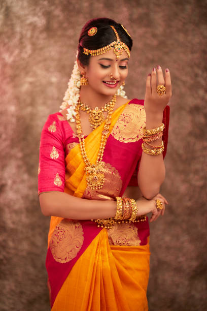 istock Beautiful smiling Indian bride with jewelry 937881770