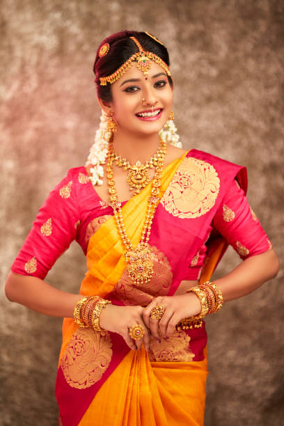istock Beautiful smiling Indian bride with jewelry 937881778