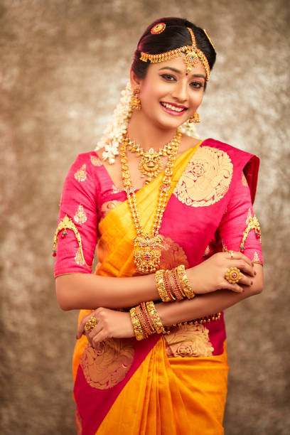 istock Beautiful smiling Indian bride with jewelry 937881794