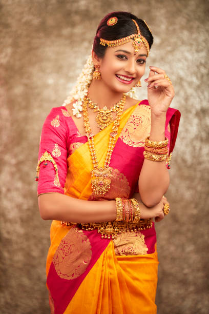 istock Beautiful smiling Indian bride with jewelry 937881798