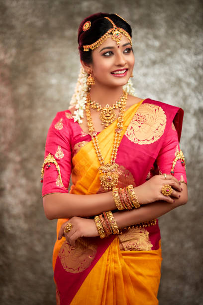 istock Beautiful smiling Indian bride with jewelry 937881800