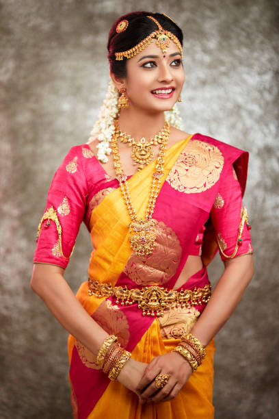 istock Beautiful smiling Indian bride with jewelry 937881808