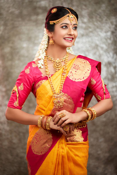 istock Beautiful smiling Indian bride with jewelry 937881810