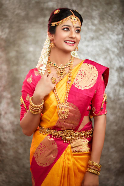 istock Beautiful smiling Indian bride with jewelry 937881816
