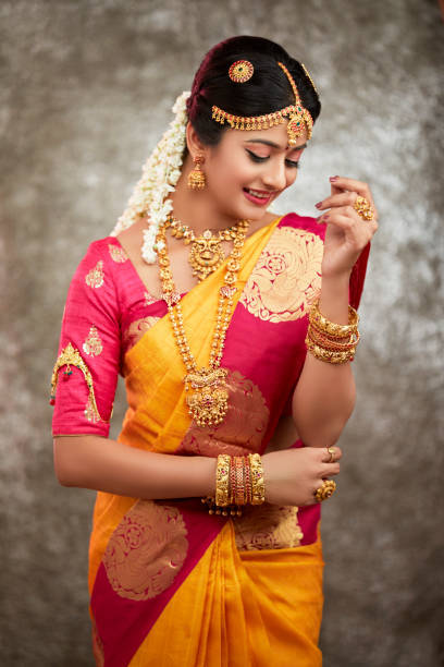 istock Beautiful smiling Indian bride with jewelry 937881824