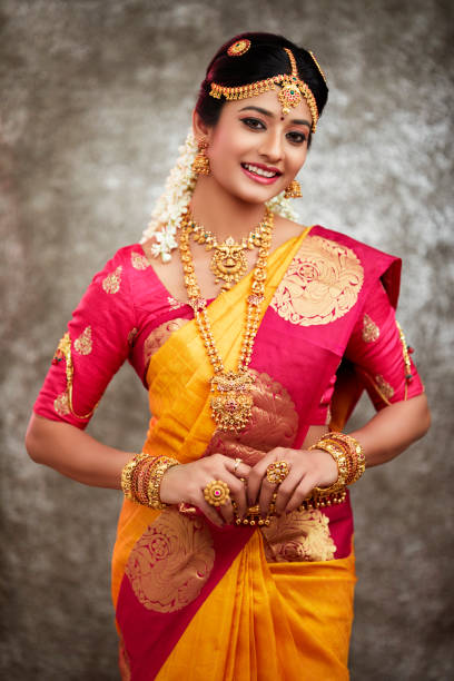 istock Beautiful smiling Indian bride with jewelry 937881828