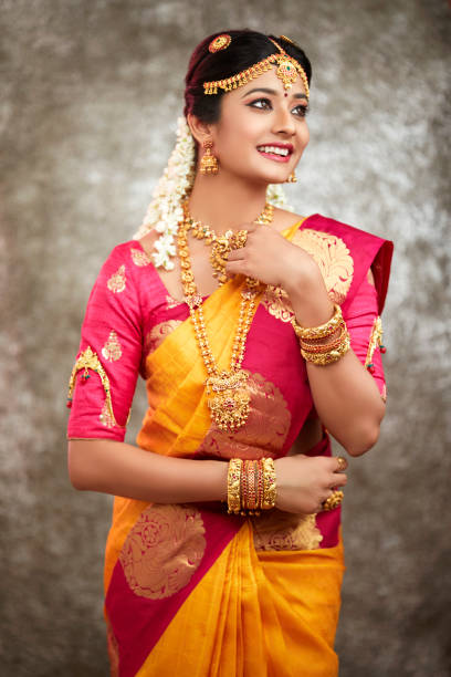istock Beautiful smiling Indian bride with jewelry 937881830
