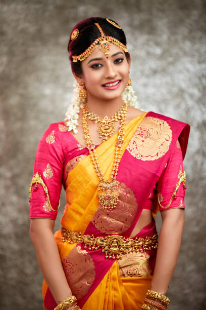 istock Beautiful smiling Indian bride with jewelry 937881832