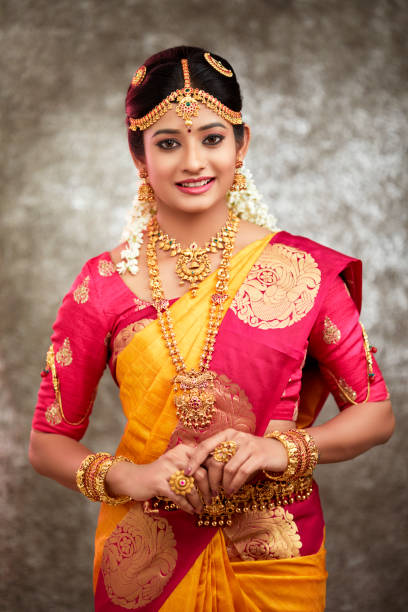 istock Beautiful smiling Indian bride with jewelry 937881834