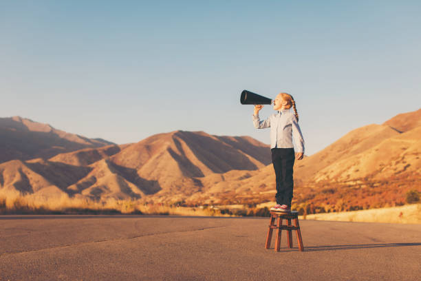 istock Young Business Girl with Megaphone 937887478