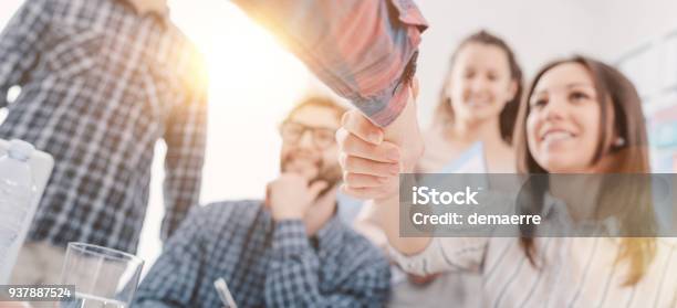 Partnerships And Startups Business People Shaking Hands Stock Photo - Download Image Now